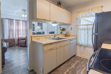 Relaxed coastal living meets scenic golf course and pond views on Rockport Country Club in Texas - for sale on GolfHomes.com, golf home, golf lot