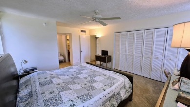 Enjoy serene lake views from this bright and spacious 3-bedroom on Palm-Aire Country Club and Resort - Palms in Florida - for sale on GolfHomes.com, golf home, golf lot