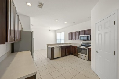 SAY HELLO TO A GOOD BUY * NEW ROOF DECEMBER 2020 * Enjoy the on Tatum Ridge Golf Links in Florida - for sale on GolfHomes.com, golf home, golf lot