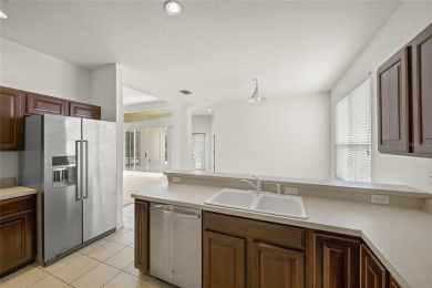 SAY HELLO TO A GOOD BUY * NEW ROOF DECEMBER 2020 * Enjoy the on Tatum Ridge Golf Links in Florida - for sale on GolfHomes.com, golf home, golf lot
