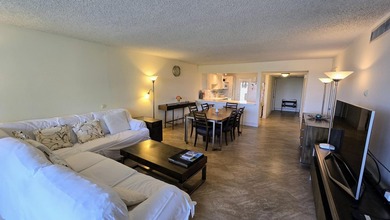 Enjoy serene lake views from this bright and spacious 3-bedroom on Palm-Aire Country Club and Resort - Palms in Florida - for sale on GolfHomes.com, golf home, golf lot