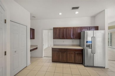 SAY HELLO TO A GOOD BUY * NEW ROOF DECEMBER 2020 * Enjoy the on Tatum Ridge Golf Links in Florida - for sale on GolfHomes.com, golf home, golf lot