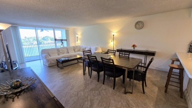 Enjoy serene lake views from this bright and spacious 3-bedroom on Palm-Aire Country Club and Resort - Palms in Florida - for sale on GolfHomes.com, golf home, golf lot