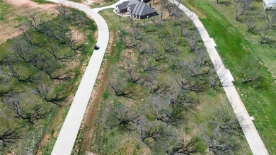 FLY IN TO THE LANDINGS 66TE  SEE THIS READY TO BUILD LOT BEFORE on Pecan Plantation Country Club in Texas - for sale on GolfHomes.com, golf home, golf lot