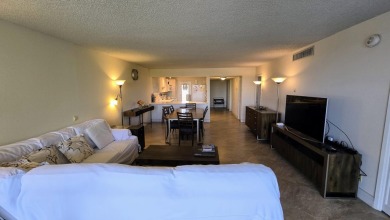 Enjoy serene lake views from this bright and spacious 3-bedroom on Palm-Aire Country Club and Resort - Palms in Florida - for sale on GolfHomes.com, golf home, golf lot
