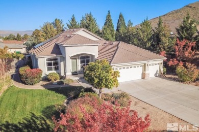 Gorgeously landscaped 1-story home in the desirable Grand Vistas on Hidden Valley Country Club in Nevada - for sale on GolfHomes.com, golf home, golf lot