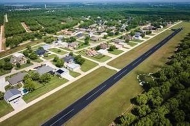 FLY IN TO THE LANDINGS 66TE  SEE THIS READY TO BUILD LOT BEFORE on Pecan Plantation Country Club in Texas - for sale on GolfHomes.com, golf home, golf lot