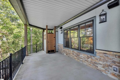 Set on a private 1.12-acre cul-de-sac lot, this expanded and on The Reserve At Lake Keowee in South Carolina - for sale on GolfHomes.com, golf home, golf lot