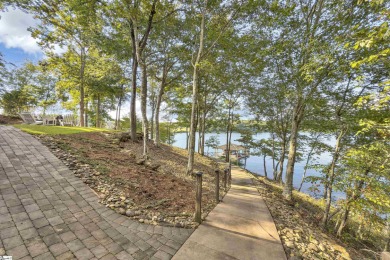 Set on a private 1.12-acre cul-de-sac lot, this expanded and on The Reserve At Lake Keowee in South Carolina - for sale on GolfHomes.com, golf home, golf lot