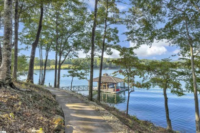 Set on a private 1.12-acre cul-de-sac lot, this expanded and on The Reserve At Lake Keowee in South Carolina - for sale on GolfHomes.com, golf home, golf lot