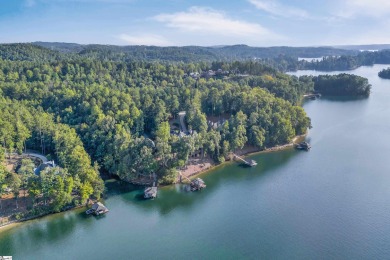 Set on a private 1.12-acre cul-de-sac lot, this expanded and on The Reserve At Lake Keowee in South Carolina - for sale on GolfHomes.com, golf home, golf lot