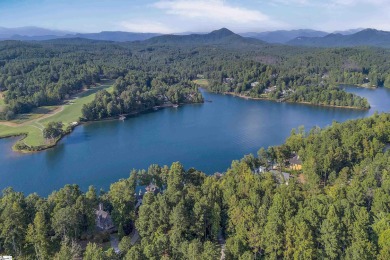 Set on a private 1.12-acre cul-de-sac lot, this expanded and on The Reserve At Lake Keowee in South Carolina - for sale on GolfHomes.com, golf home, golf lot