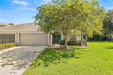 Under contract-accepting backup offers. WELL-MAINTAINED on Tampa Bay Golf and Country Club in Florida - for sale on GolfHomes.com, golf home, golf lot