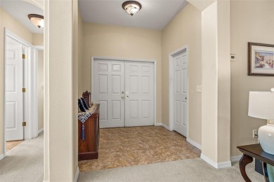 Under contract-accepting backup offers. WELL-MAINTAINED on Tampa Bay Golf and Country Club in Florida - for sale on GolfHomes.com, golf home, golf lot