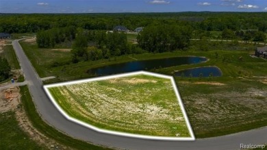 UNIT # 27 VISTAS OF OAKLAND - 1.1 ACRE HOMESITE BACKING TO POND on The Myth Golf and Banquet - Beaver Creek Links in Michigan - for sale on GolfHomes.com, golf home, golf lot