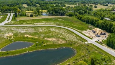 UNIT # 27 VISTAS OF OAKLAND - 1.1 ACRE HOMESITE BACKING TO POND on The Myth Golf and Banquet - Beaver Creek Links in Michigan - for sale on GolfHomes.com, golf home, golf lot