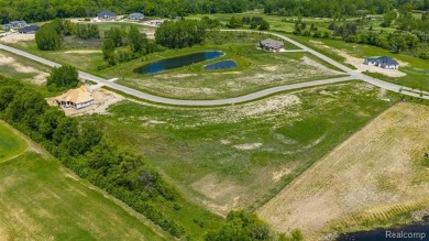 UNIT # 27 VISTAS OF OAKLAND - 1.1 ACRE HOMESITE BACKING TO POND on The Myth Golf and Banquet - Beaver Creek Links in Michigan - for sale on GolfHomes.com, golf home, golf lot