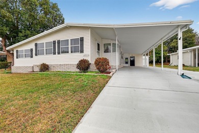 Welcome home to this charming 2 Bedroom, 2 Bathroom residence on Zellwood Station Country Club in Florida - for sale on GolfHomes.com, golf home, golf lot