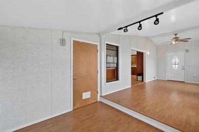 Welcome home to this charming 2 Bedroom, 2 Bathroom residence on Zellwood Station Country Club in Florida - for sale on GolfHomes.com, golf home, golf lot