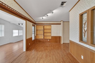 Welcome home to this charming 2 Bedroom, 2 Bathroom residence on Zellwood Station Country Club in Florida - for sale on GolfHomes.com, golf home, golf lot