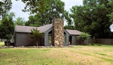 This 2,066 sq. ft. home has a warm, inviting atmosphere with its on Big Lake Country Club in Arkansas - for sale on GolfHomes.com, golf home, golf lot