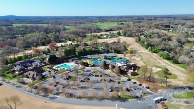 This lot is located in an artfully designed full service on Rock Barn Golf and Spa in North Carolina - for sale on GolfHomes.com, golf home, golf lot