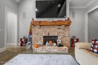 Tucked away in a quiet cul-de-sac within the highly desired on Colonial Country Club Deerfield in Mississippi - for sale on GolfHomes.com, golf home, golf lot