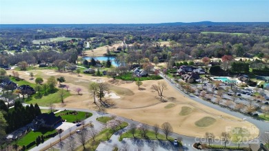 This lot is located in an artfully designed full service on Rock Barn Golf and Spa in North Carolina - for sale on GolfHomes.com, golf home, golf lot
