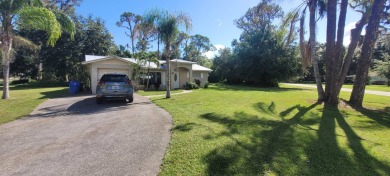 VERY LARGE 3/3/1 HOME ON 1/2 ACRE, CORNER LOT IN HIGHLY on Spring Lake Golf Resort in Florida - for sale on GolfHomes.com, golf home, golf lot