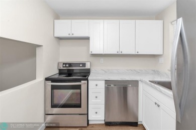 TURNKEY! NEWLY RENOVATED! Welcome to your dream home in the on Sunrise Lakes Phase III in Florida - for sale on GolfHomes.com, golf home, golf lot