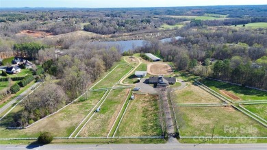 This lot is located in an artfully designed full service on Rock Barn Golf and Spa in North Carolina - for sale on GolfHomes.com, golf home, golf lot