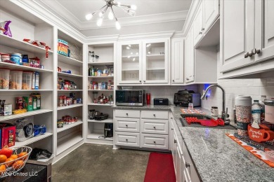 Tucked away in a quiet cul-de-sac within the highly desired on Colonial Country Club Deerfield in Mississippi - for sale on GolfHomes.com, golf home, golf lot