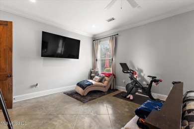 Tucked away in a quiet cul-de-sac within the highly desired on Colonial Country Club Deerfield in Mississippi - for sale on GolfHomes.com, golf home, golf lot