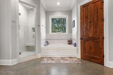 Tucked away in a quiet cul-de-sac within the highly desired on Colonial Country Club Deerfield in Mississippi - for sale on GolfHomes.com, golf home, golf lot