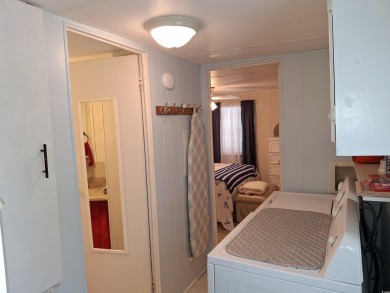 Move-in ready home in Intracoastal Waterway community 1.1 mile on Barefoot Resort and Golf Club  in South Carolina - for sale on GolfHomes.com, golf home, golf lot