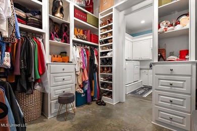 Tucked away in a quiet cul-de-sac within the highly desired on Colonial Country Club Deerfield in Mississippi - for sale on GolfHomes.com, golf home, golf lot