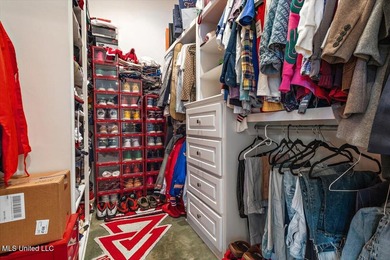 Tucked away in a quiet cul-de-sac within the highly desired on Colonial Country Club Deerfield in Mississippi - for sale on GolfHomes.com, golf home, golf lot