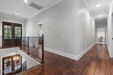 Tucked away in a quiet cul-de-sac within the highly desired on Colonial Country Club Deerfield in Mississippi - for sale on GolfHomes.com, golf home, golf lot