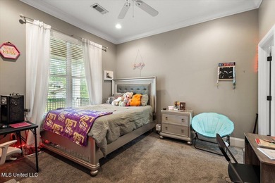 Tucked away in a quiet cul-de-sac within the highly desired on Colonial Country Club Deerfield in Mississippi - for sale on GolfHomes.com, golf home, golf lot