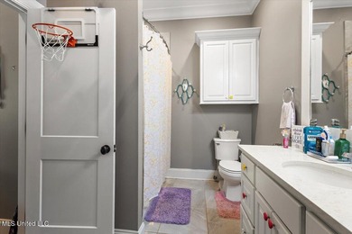 Tucked away in a quiet cul-de-sac within the highly desired on Colonial Country Club Deerfield in Mississippi - for sale on GolfHomes.com, golf home, golf lot