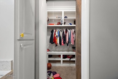 Tucked away in a quiet cul-de-sac within the highly desired on Colonial Country Club Deerfield in Mississippi - for sale on GolfHomes.com, golf home, golf lot