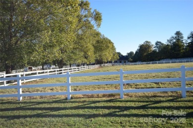 This lot is located in an artfully designed full service on Rock Barn Golf and Spa in North Carolina - for sale on GolfHomes.com, golf home, golf lot