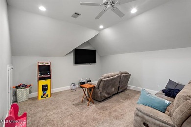 Tucked away in a quiet cul-de-sac within the highly desired on Colonial Country Club Deerfield in Mississippi - for sale on GolfHomes.com, golf home, golf lot