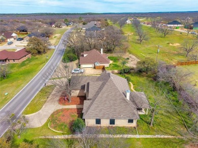 Nestled in the highly desirable Pecan Plantation community, this on Pecan Plantation Country Club in Texas - for sale on GolfHomes.com, golf home, golf lot
