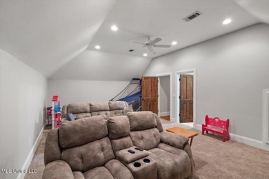 Tucked away in a quiet cul-de-sac within the highly desired on Colonial Country Club Deerfield in Mississippi - for sale on GolfHomes.com, golf home, golf lot