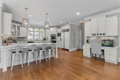 Welcome to this exceptional home offering 7 bedroom, 6.5 baths on Alpharetta Athletic Club East in Georgia - for sale on GolfHomes.com, golf home, golf lot