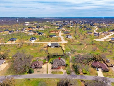 Nestled in the highly desirable Pecan Plantation community, this on Pecan Plantation Country Club in Texas - for sale on GolfHomes.com, golf home, golf lot