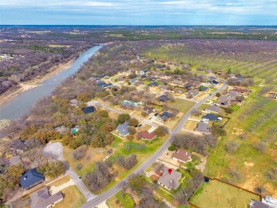 Nestled in the highly desirable Pecan Plantation community, this on Pecan Plantation Country Club in Texas - for sale on GolfHomes.com, golf home, golf lot
