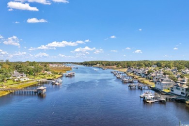 Welcome home to this fully furnished 3 bedroom 2 bathroom first on Glen Dornoch Waterway Golf Links in South Carolina - for sale on GolfHomes.com, golf home, golf lot