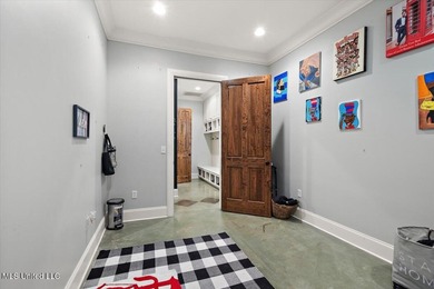 Tucked away in a quiet cul-de-sac within the highly desired on Colonial Country Club Deerfield in Mississippi - for sale on GolfHomes.com, golf home, golf lot